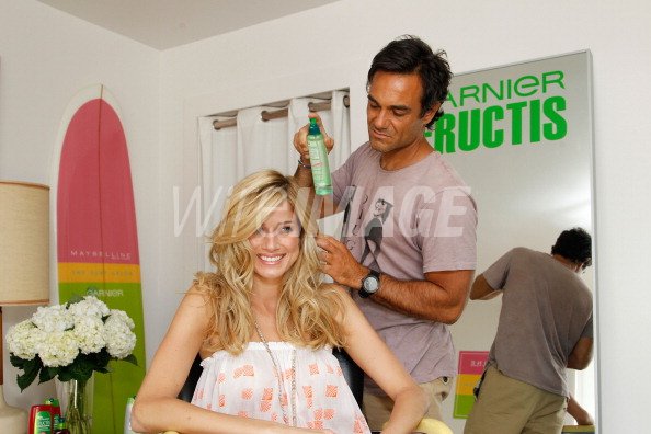 Celebrity hair stylist Danny DiMauro works on model Cary Poole at the... | WireImage | 133353153 Celebrity hair stylist Danny DiMauro works on model Cary Poole at the... | WireImage | 133353153