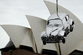 Mirrored "Disco Car" Suspended Over Sydney Harbour