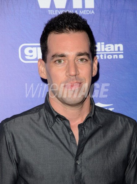 Actor John Roberts arrives at Variety and Women in Film Pre EMMY Event