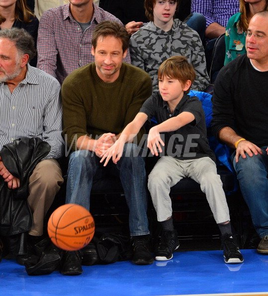 David Duchovny and Kyd Miller Duchovny attend the Denver Nuggets vs David Duchovny and Kyd Miller Duchovny attend the Denver Nuggets vs