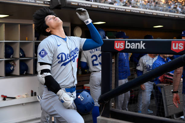 Shohei Ohtani of the Los Angeles Dodgers flips his hair before the game against the San Diego Padres at Petco Park on July 30, 2024 in San Diego,...
