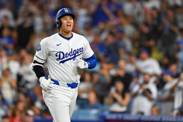 Los Angeles Dodgers designated hitter Shohei Ohtani celebrates after hitting his solo home run in 8th inning of the MLB game between the Philadelphia...