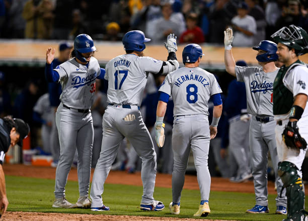 Shohei Ohtani of Los Angeles Dodgers celebrate with teamates after hitting a three run homerun,his 33 homerun of the season in the bottom of the...
