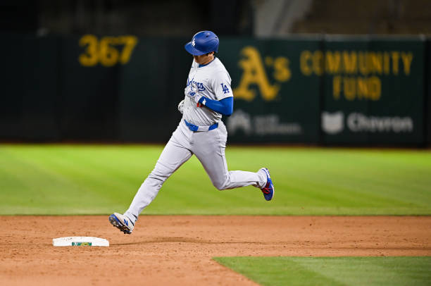 Shohei Ohtani of Los Angeles Dodgers runs the bases afrer hitting a three run homerun,his 33 homerun of the season in the bottom of the ninth inning...