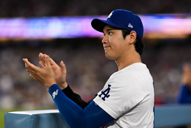 Shohei Ohtani of Los Angeles Dodgers reacts in the t of the fifth inning during the regular season game against the Philadelphia Phillies at Dodger...