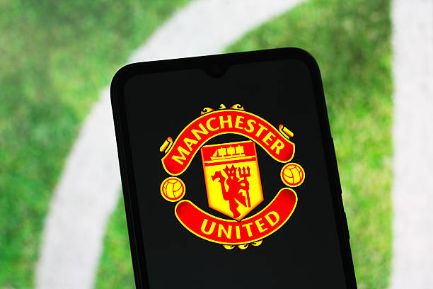 Logo Manchester United trên màn hình điện thoại