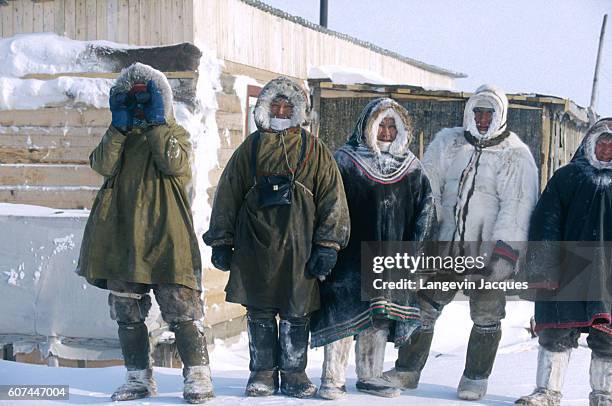 Türk Mitolojisi: Tanımı Kökenleri ve İçeriği 18 a group of dolgans stand together at their camp near the village of syndassko russia the