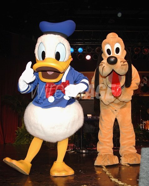 Disney cartoon characters Donald Duck and Pluto perform at the... |  WireImage | 72633838