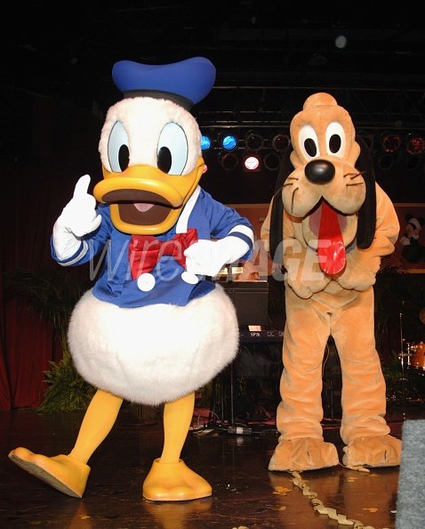 Disney cartoon characters Donald Duck and Pluto perform at the... | WireImage | 72633838 Disney cartoon characters Donald Duck and Pluto perform at the... | WireImage | 72633838