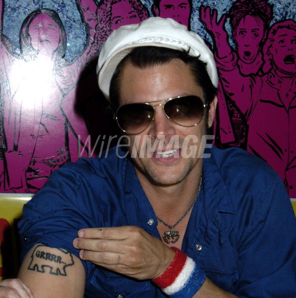 Johnny Knoxville showing his tattoo WireImage 83645403