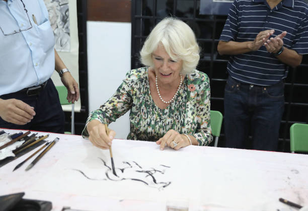camilla-duchess-of-cornwall-paints-a-picture-of-a-horse-during-her-picture-id868816758