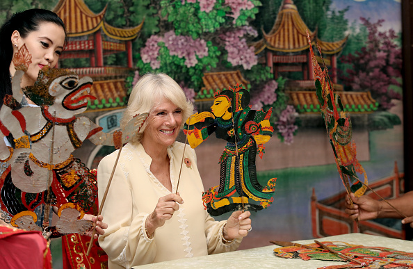camilla-duchess-of-cornwall-takes-part-in-a-traditional-puppet-show-picture-id871088256