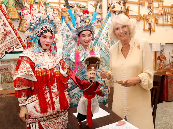 camilla-duchess-of-cornwall-takes-part-in-a-traditional-puppet-show-picture-id871095690