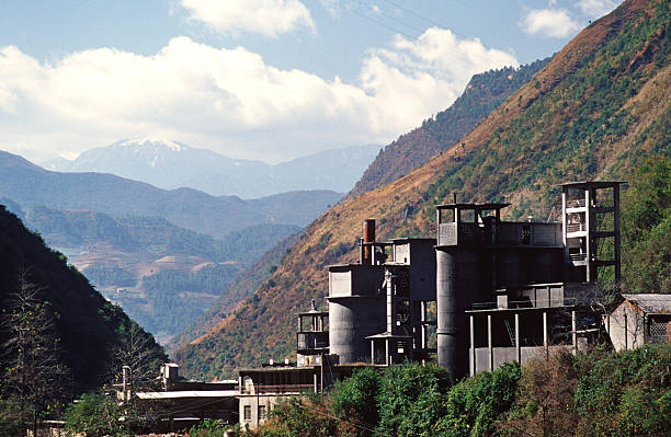 A cement plant sits in a valley near Liuku in Yunnan Province. .
