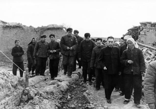 Chinese Premier Zhou Enlai visiting the site of destruction the day after a strong earthquake hit the vicinity of Xingtai in northern China's Hebei...