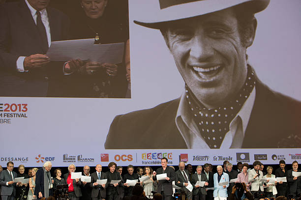 Dominique Sanda, Laure Marsac, Bertrand Tavernier, Francoise Arnoul, Pierre Richard, Jean Becker, Gerard Collomb, Jean Michel Jarre, Daniel Auteuil, Richard Berry, Patrick Timsit, Claudia Cardinale, Quentin Tarantino, Jean Pierre Marielle, Charles Gerard, Claude Lelouch, Radu Mihaileanu, Melanie Thierry and Pascal Elbe on stage during the Tribute to Jean Paul Belmondo and Opening Ceremony of the Fifth Lumiere Film Festival, in Lyon.