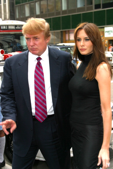 Donald Trump and Melania Knauss during MercedesBenz Fashion Week Spring Collections 2003 Celebrities at Bryant Park at Bryant Park in New York City...