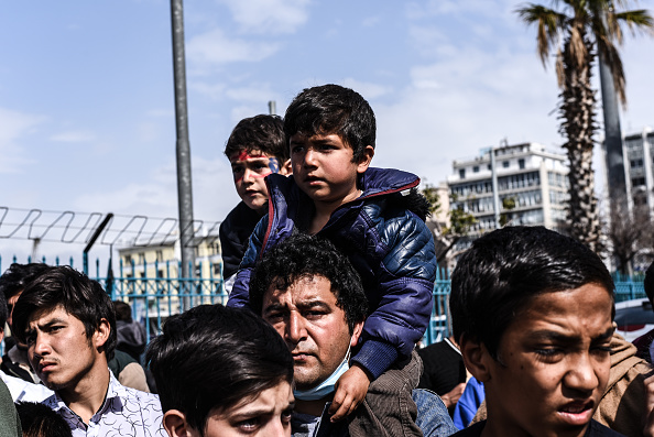 Afghani demonstrating against closed borders in Piraeus