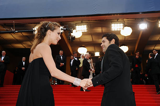 Jamel Debbouze and Melissa Theuriau attend the Premiere of 'Outside of the law' during the 63rd Cannes International Film Festival
