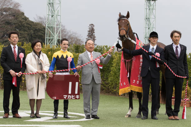 Jockey Christophe Lemaire, owner Makoto Kaneko, trainer Yasuo Tomomichi celebrate after Makahiki wins the Race 11 Yayoi Sho - Japanese 2000 Guineas Trial (G2 2000m) at Nakayama Racecourse on March 6, 2016 in Funabashi, Chiba, Japan.