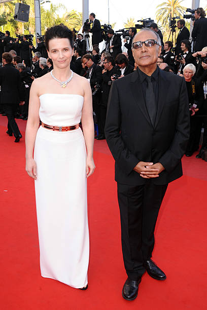 Juliette Binoche and Abbas Kiarostami attend the premiere of 'The tree' during the 63rd Cannes International Film Festival.