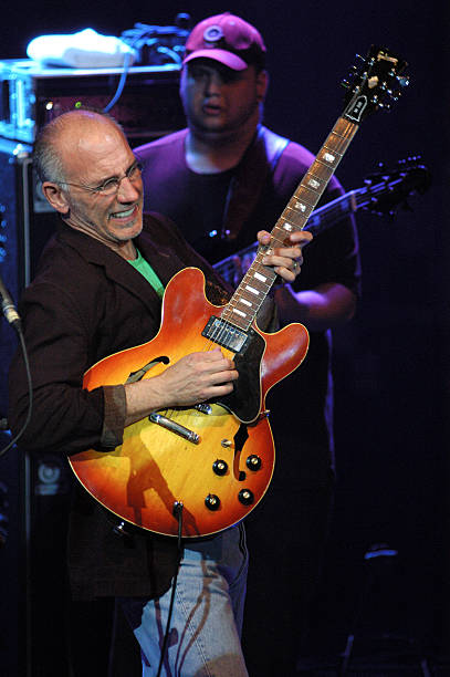 Larry Carlton and Travis Carlton perform on stage at Luz de Gas on May 12, 2005 in Barcelona, Spain.