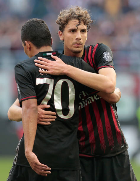 manuel-locatelli-of-ac-milan-embraces-carlos-bacca-of-ac-milan-during-picture-id666500628