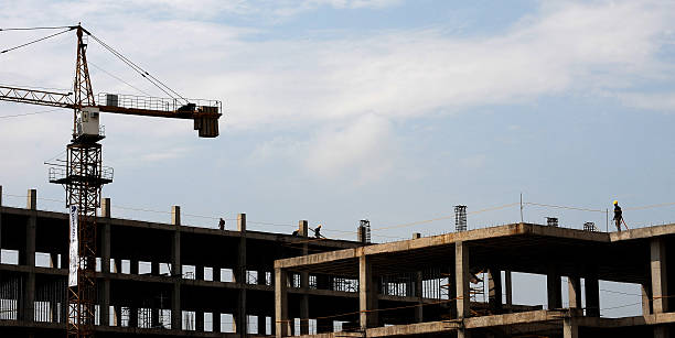 Men work at a construction site on May 25, 2010 in Cali, Colombia.