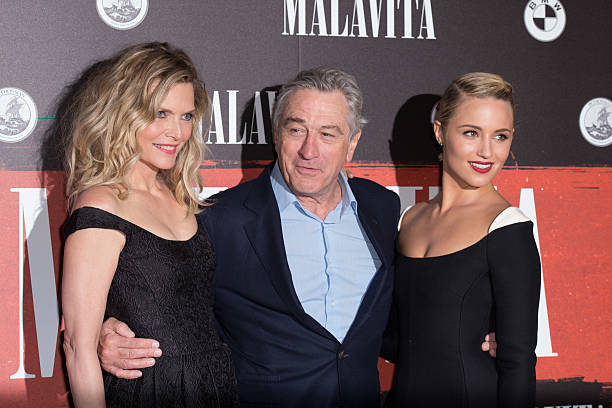 Michelle Pfeiffer, Robert De Niro and Dianna Agron attend the 'Malavita' premiere at Europacorp Cinemas at Aeroville Shopping Center, in Roissy-en-France, France.