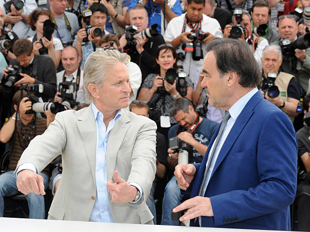 Oliver Stone and Michael Douglas at the photocall for 'Wall street : Money never sleeps' during the 63rd Cannes International Film Festival.