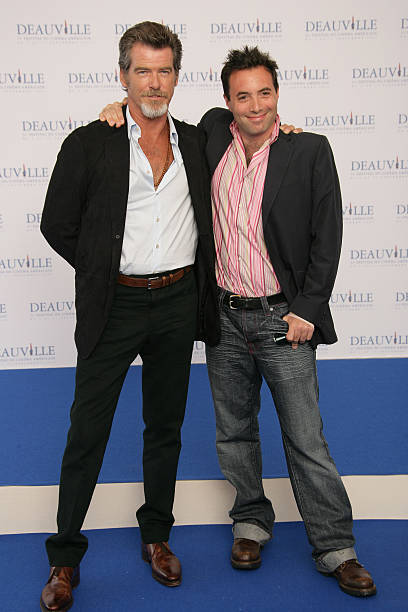 Pierce Brosnan, Richard Shepard pose for 'The Matador' photocall during the 31st American Deauville Film Festival.