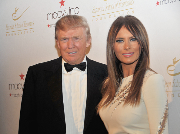 Portrait of American businessman and television personality Donald Trump and his wife Slovenian former model Melania as they attend a dinner for the...