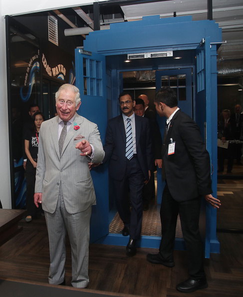 prince-charles-the-prince-of-wales-enters-through-a-door-shaped-in-picture-id869639028
