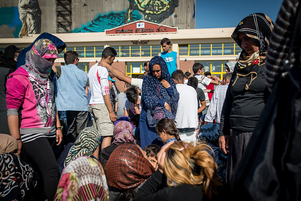 Pireaus Harbour, Migrants going to official camp