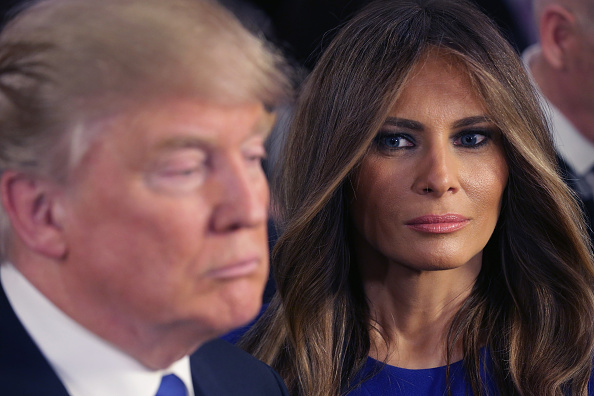 Republican presidential candidate Donald Trump and his wife Melania greet reporters in the spin room following a debate sponsored by Fox News at the...