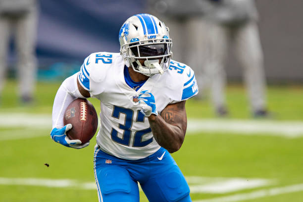 Running back D"u2019Andre Swift of the Detroit Lions runs the ball during a game against the Tennessee Titans at Nissan Stadium on December 20, 2020...