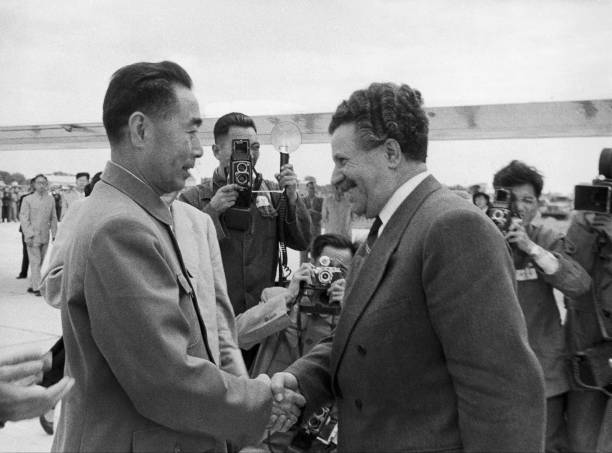 The Chinese Prime Minister ZHOU ENLAI greeting Bulgarian Prime Minister Anto YUGOV upon his arrival in Peking on September 14 1957