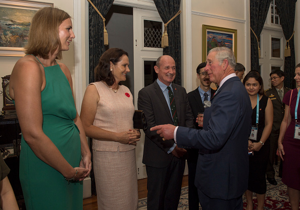 the-prince-of-wales-jokes-with-guests-as-their-royal-highnesses-the-picture-id868968172