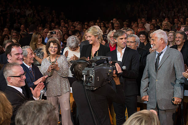 Thierry Fremaux, Quentin Tarantino, Jean Rochefort, Claudia Cardinale, Luana Belmondo, Paul Belmondo and Jean Paul Belmondo attend the Tribute to Jean Paul Belmondo and Opening Ceremony of the Fifth Lumiere Film Festival, in Lyon.