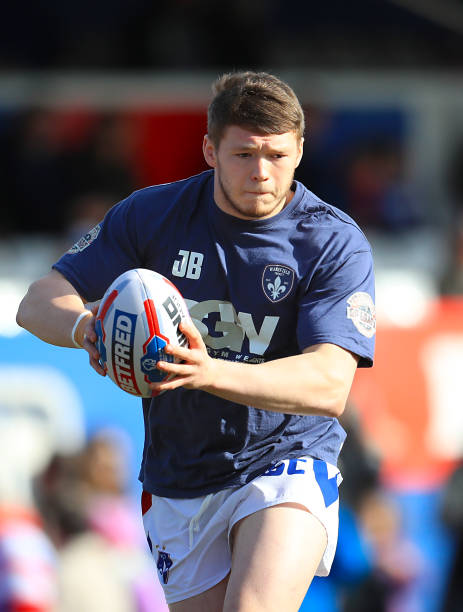 Wakefield's James Batchelor warms up prior to the match