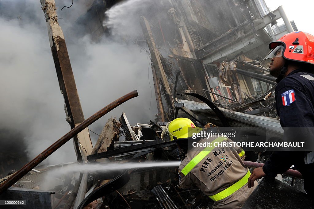 Thai firemen fight the fire at Thailand'