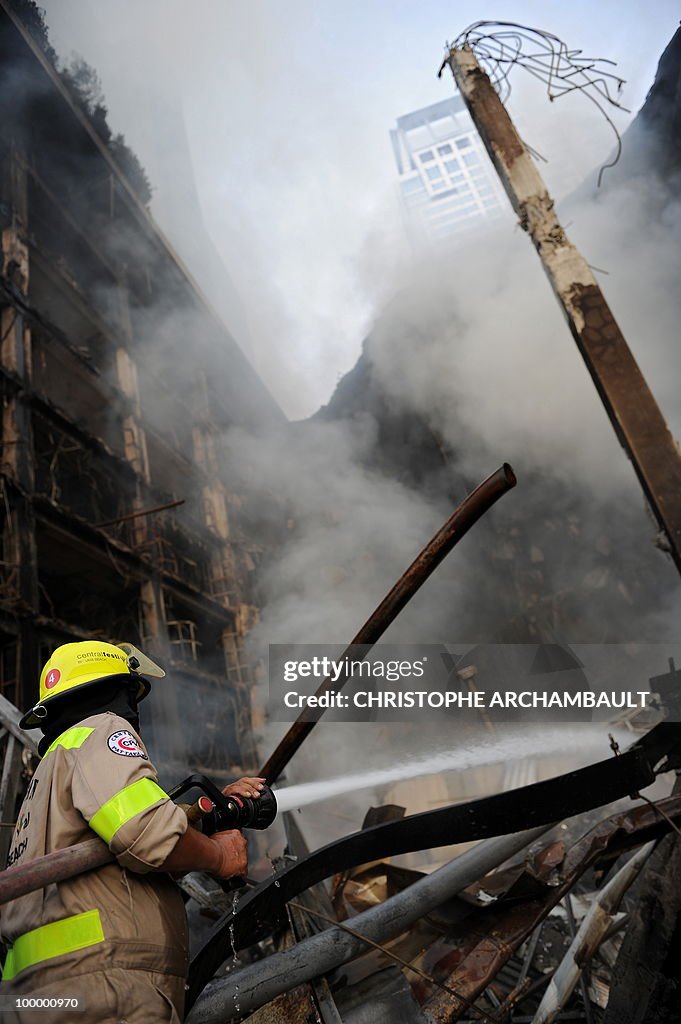 Thai firemen fight the fire at Thailand'