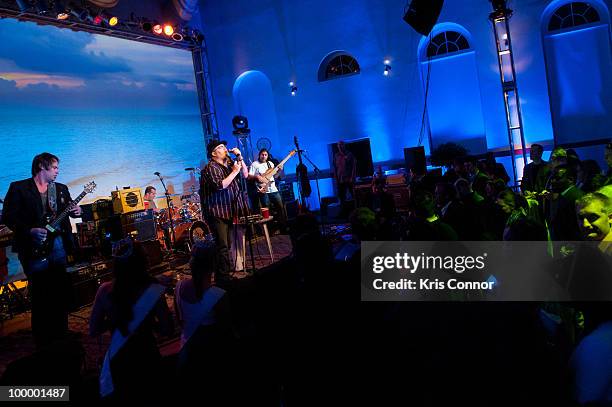 Guests watch Blues Traveler perform during the America's Everglades Summit to Unite Conservation celebration at Eastern Market on May 19, 2010 in...