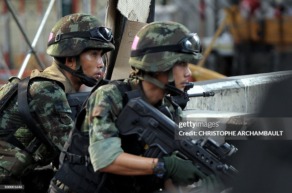 Soldiers take position after gunshots we