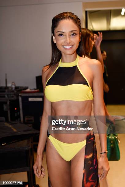 Models pose backstage at Miami Swim Week powered by Art Hearts Fashion Swim/Resort 2018/19 at Faena Forum on July 15, 2018 in Miami Beach, Florida.