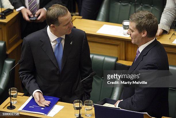 New Zealand's Finance Minister Bill English with Prime Minister of New Zealand John Key talk before the reading of the Budget at Parliament House on...
