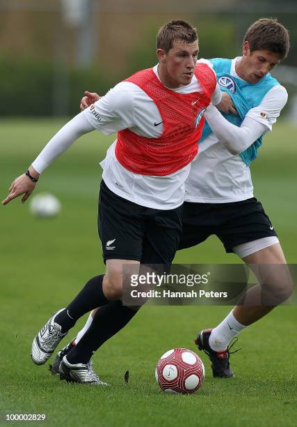 Chris Wood competes with Andrew Boyens for the ball during a New Zealand All Whites training session at North Harbour Stadium on May 20, 2010 in...