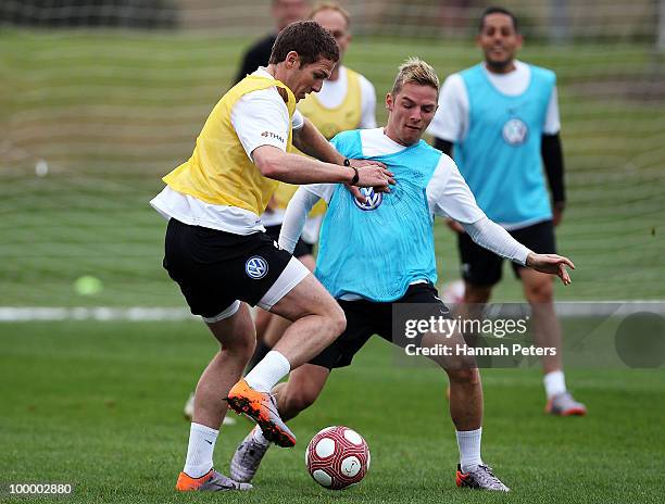 Chris Killen competes with David Mulligan for the ball during a New Zealand All Whites training session at North Harbour Stadium on May 20, 2010 in...