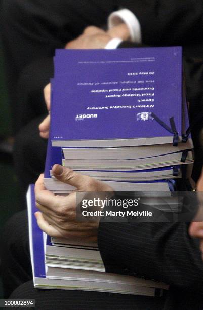 Pile of Budget books are seen before the reading of the Budget at Parliament House on May 20, 2010 in Wellington, New Zealand. English announced tax...