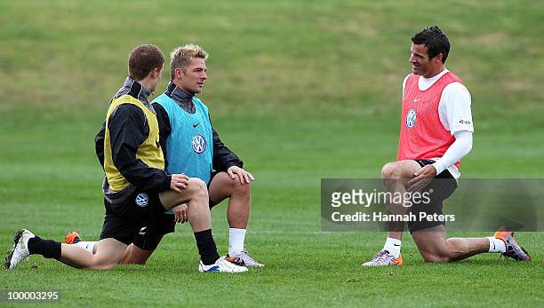Chris Killen, David Mulligan and Ryan Nelsen stretch during a New Zealand All Whites training session at North Harbour Stadium on May 20, 2010 in...